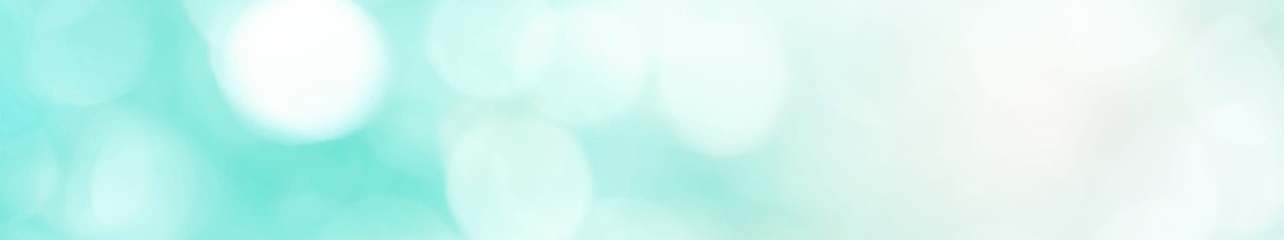 An abstract shallow depth of field photograph over teal